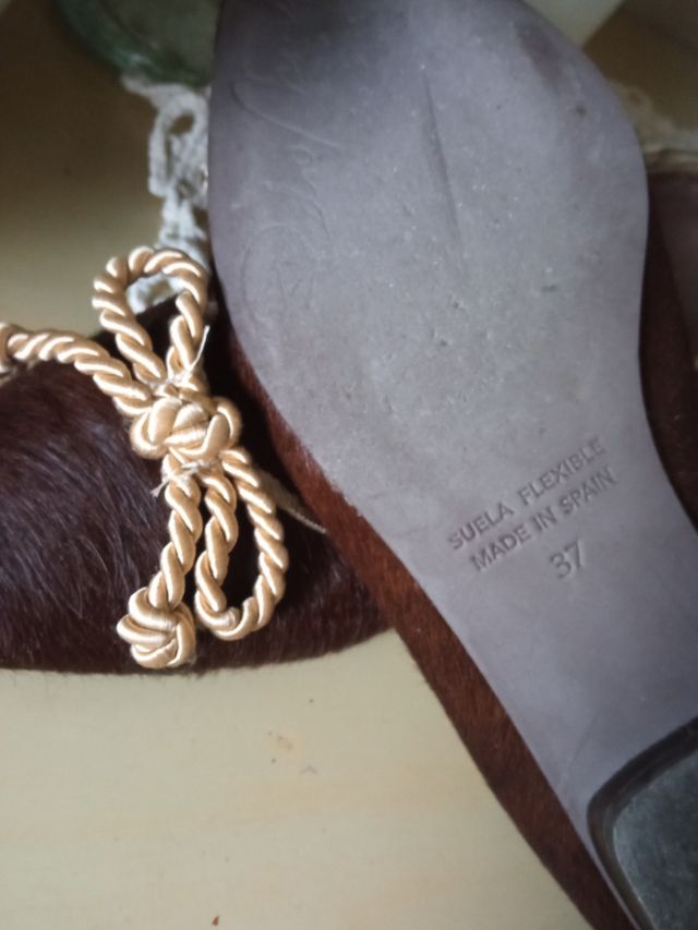 Scarpe in pelle con pelliccia marrone