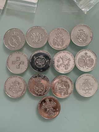 Colección de 12 monedas de Cofradías plata de ley.