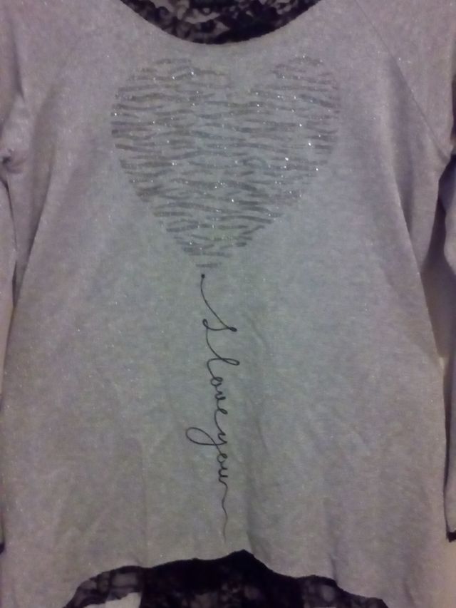 Maglia lurex grigio con pizzo nero