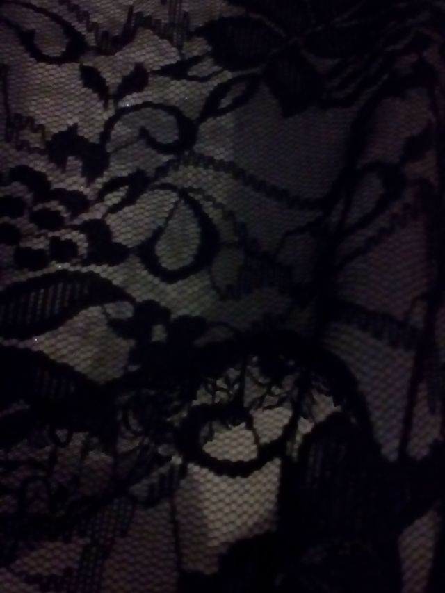 Maglia lurex grigio con pizzo nero