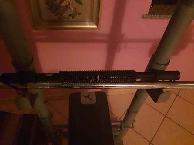 Manubrio a molla per pettorali e braccia