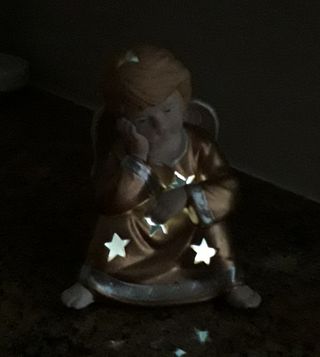 soprammobile angelo portacandela