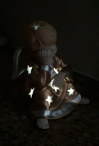 soprammobile angelo portacandela