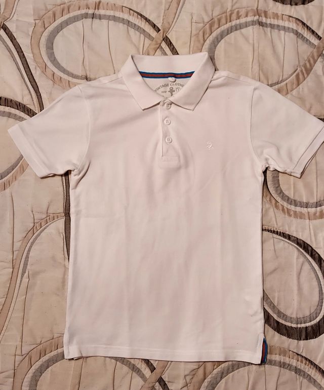 Conjunto polo y pantalones cortos T.9-10