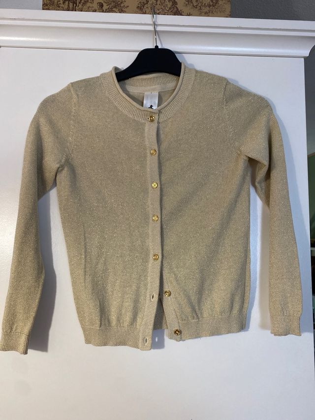 chaqueta punto dorado niña