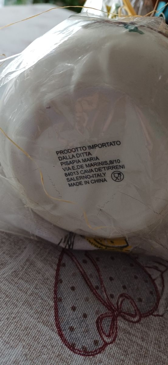 Bottiglia di aceto e strofinaccio di Ischia