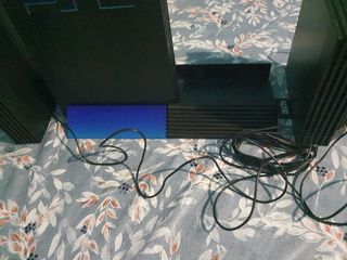 Ps2 con mando y altavoces