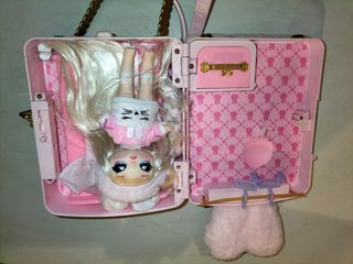 Muñeca Na Na Na con mochila