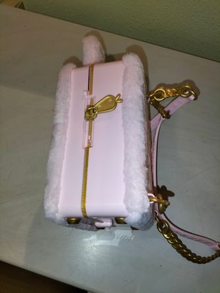 Muñeca Na Na Na con mochila