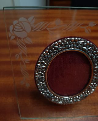 Cornice in vetro e argento