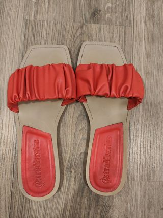 Chanclas planas naranjas