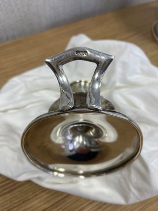 Palmatoria antigua con baño de plata