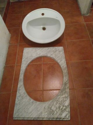 Lavabo encastrado con encimera de marmol