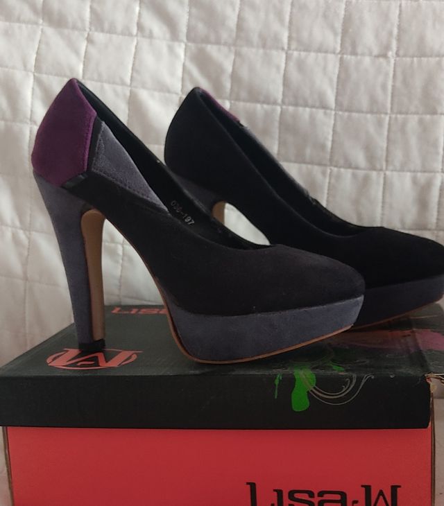 Scarpe con tacco alto