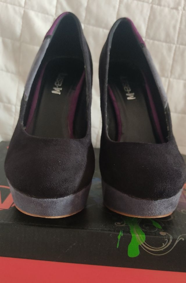 Scarpe con tacco alto