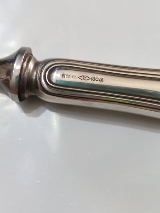 Apri bottiglie in argento 800