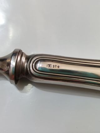 Apri bottiglie in argento 800