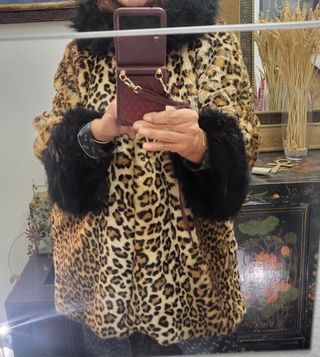 Chaquetón capucha animal print