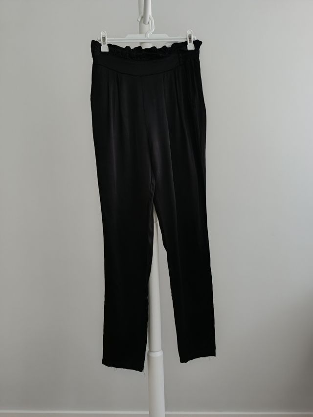 Le vélo. Pantalones negros fluídos