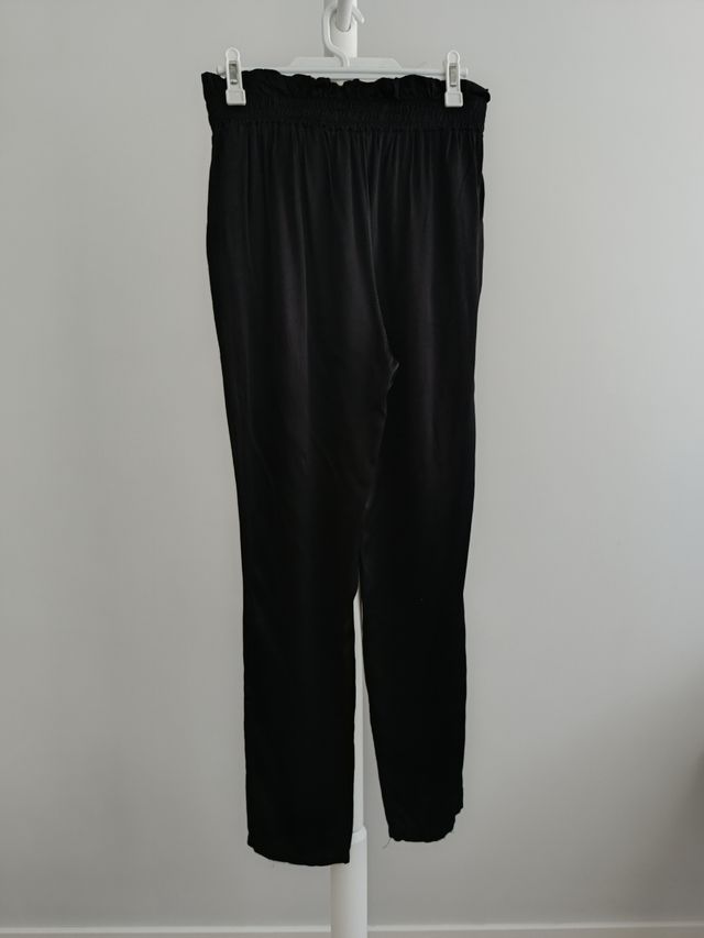 Le vélo. Pantalones negros fluídos