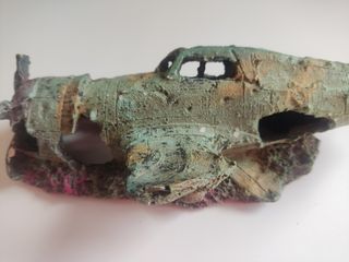 Adorno Acuario restos avión