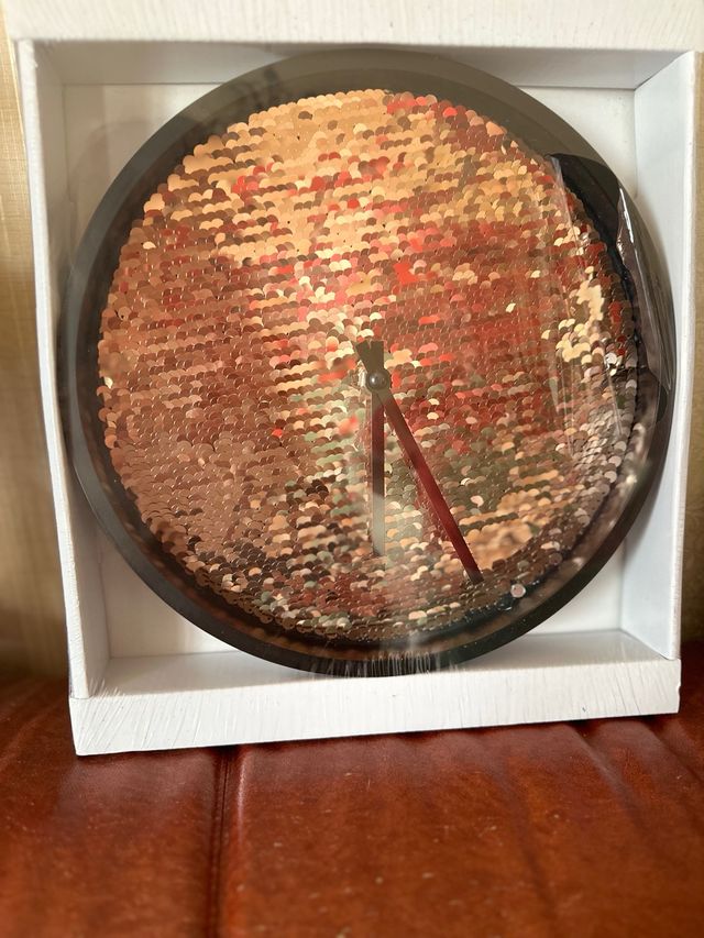 orologio da parete con paillettes