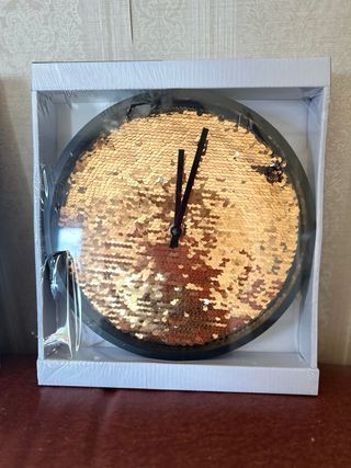 orologio da parete con paillettes