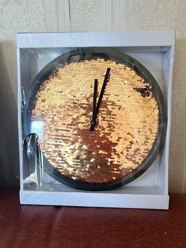 orologio da parete con paillettes