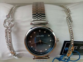 CON  ETIQUETA.Conjunto de reloj y 2 pulseras SIN E