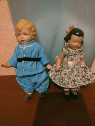 Muñecas de porcelana y muñecas de payasitas