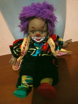 Muñecas de porcelana y muñecas de payasitas