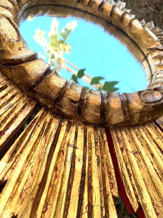 ANTIGUO ESPEJO SOL DORADO