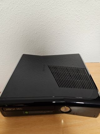 Consola Xbox 360 con juegos y volante