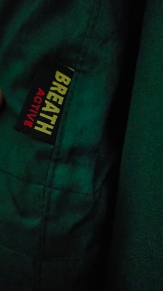 Mono o Traje impermeable.