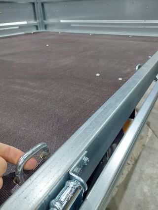 remolque doble eje ruedas dentro caja