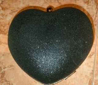 Bolsos de mano forma corazón