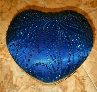Bolsos de mano forma corazón