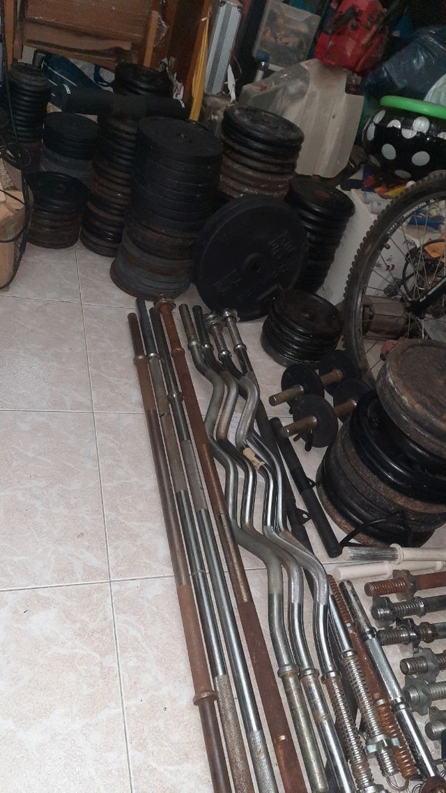 Barra prees y mancuernas y discos