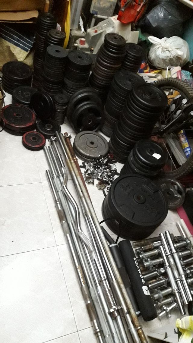Barra prees y mancuernas y discos