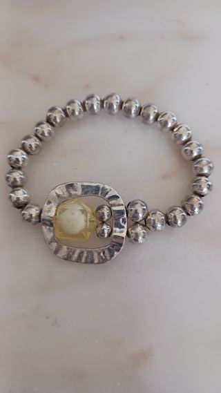 collar, pulsera, y pendientes de bisutería.JOSCA