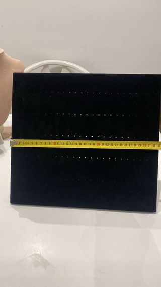 expositor pendientes