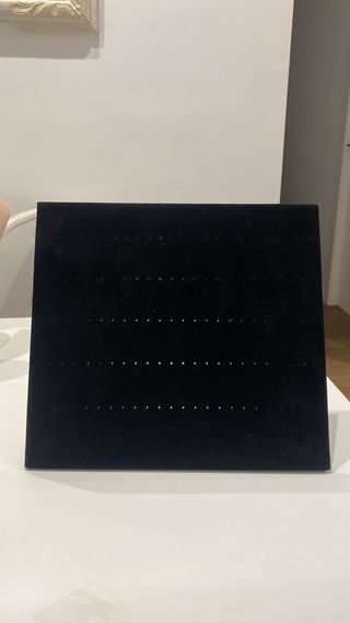 expositor pendientes