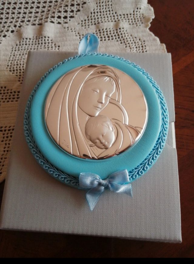 Capezzale in argento per culla