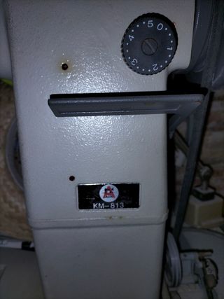 Maquina de coser en columna