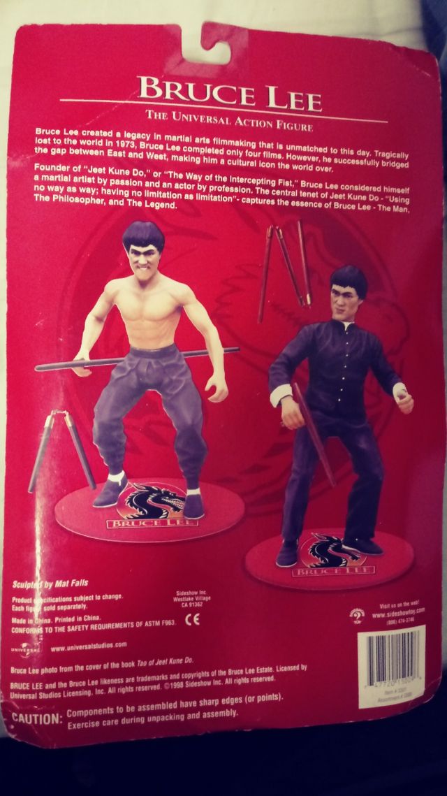 FIGURA BRUCE LEE CON BLISTER ABIERTO