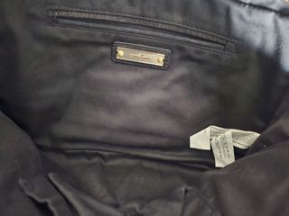 Bolso con muñequera Zara