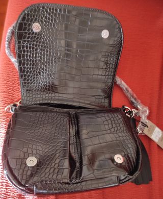 Bolso de Gloria Ortiz con etiqueta