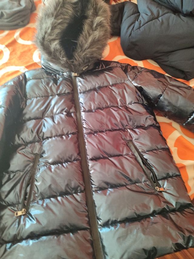 Anorak plumas, color azul  . comprado en boutique