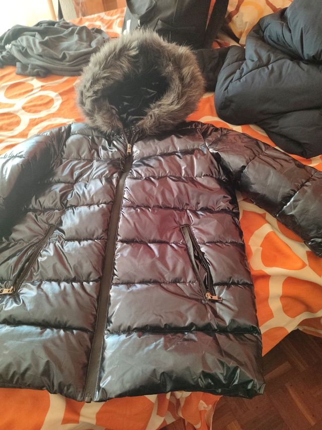 Anorak plumas, color azul  . comprado en boutique