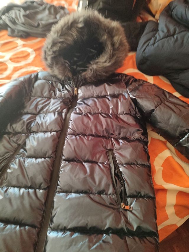 Anorak plumas, color azul  . comprado en boutique